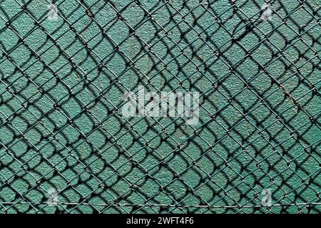 Green mesh, rhombus grid on green background Stock Photo