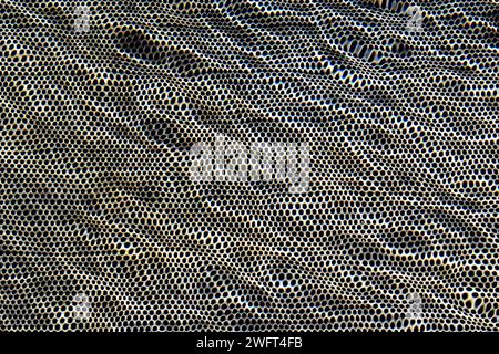 Perforated metal surface underwater texture background Stock Photo
