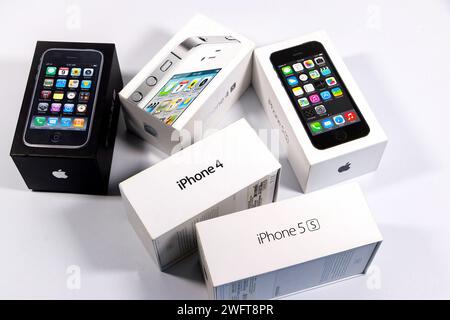 group of  vintage old apple iphone boxes packaging, iphone 3gs, iphone 4 white studio background Stock Photo