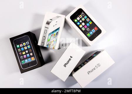 group of vintage old apple iphone boxes packaging, iphone 3gs, iphone 4 white studio background Stock Photo