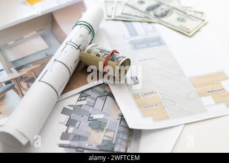 engineering tools on wooden table with drawings apartments top view Stock Photo