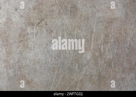 abstract of old dirty scratched metal surface background, weathered grey textured aluminum or silver, rustic wallpaper or backdrop for graphic design Stock Photo