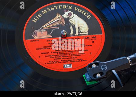 The Art of Segovia The HMV Recordings 1927-39 vinyl record album LP with tonearm, cartridge, headshell and stylus on turntable record player Stock Photo