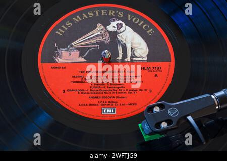 The Art of Segovia The HMV Recordings 1927-39 vinyl record album LP with tonearm, cartridge, headshell and stylus on turntable record player Stock Photo