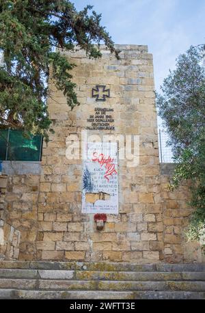 Controversial damaged Nazi-era memorial to the German paratroopers who invaded Crete in the Second World War, Chania Stock Photo