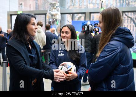 Berlin, Germany. 01st Feb, 2024. Annalena Baerbock (l, Bündnis 90/Die Grünen), Foreign Minister, talks to two young female footballers at the Foreign Minister Baerbock's visit of soccer ambassadors from the Federal Foreign Office for UEFA EURO 2024. The next European Football Championship (UEFA EURO 2024) will take place in Germany between 14.06.2024 and 14.07.2024. Credit: Bernd von Jutrczenka/dpa/Alamy Live News Stock Photo