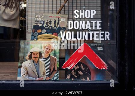 Vinyl LPs in the window of a Shelter charity shop n Newington, Edinburgh, Scotland, UK. Stock Photo