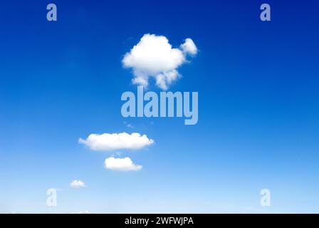 a small cumulus cloud in the blue sky Stock Photo