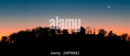 Sunset behind hillside in central Virginia in winter. Stock Photo
