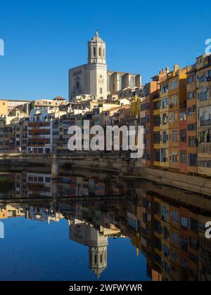 Girona colorful buildings  and cathedral reflected in Onyar River Stock Photo