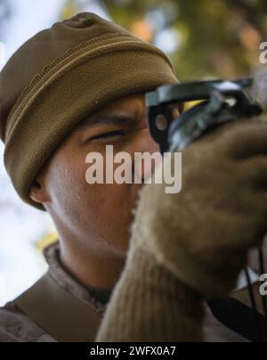 Recruits with India Company, 3rd Recruit Training Battalion, conduct the land navigation course on Marine Corps Recruit Depot Parris Island, S.C., Jan. 17, 2024. Land navigation is part of Basic Warrior Training and is designed to teach recruits how to use a lensatic compass and topographic map. Stock Photo