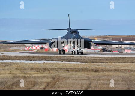 A B-1B Lancer assigned to the 37th Bomb Squadron taxis on the flightline at Ellsworth Air Force Base, South Dakota, Jan. 25, 2024. The flights are the first missions since the base’s airfield was closed Jan. 4 following the bomber crash where all four aircrew safely ejected. Stock Photo