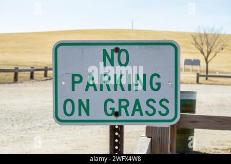 No Parking on Grass Sign in Public Park Stock Photo