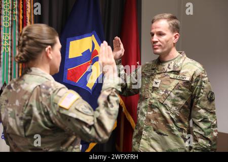 U.S. Army Reserve Brig. Gen. Karen Monday-Gresham, Commanding General of the 7th Mission Support Command, administers the oath of office to her staff judge advocate, newly promoted U.S. Army Reserve Col. Jason Frankenfield, during a ceremony held at the command headquarters, Saturday, Jan. 24, 2024, in Kaiserslautern, Germany. The 7th Mission Support Command is America's Army Reserve presence in Europe. Comprised of 26 units across Germany and Italy, the 7th MSC provides logistical and sustainment support for U.S. Army Europe - Africa missions across the theater. For more stories and informati Stock Photo