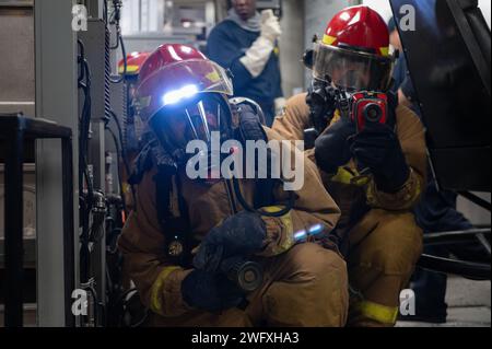 240126-N-UF626-1408, NORFOLK, Va. – U.S. Navy Sailors assigned to the San Antonio class amphibious transport dock US New York (LPD-21) perform an overhaul during a mass casualty drill aboard the ship, Jan. 26, 2024. New york was conducting a mass casualty drill in order to maintain warfighting readiness. Stock Photo