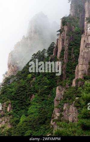The Sea of Clouds floats amidst the North Sea area of Huangshan Yellow Mountains in China. Stock Photo