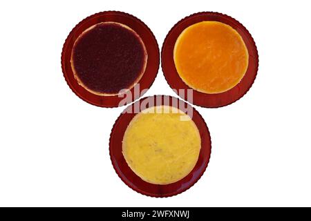 cheesecakes isolated on white background, Raspberry, lemon and orange cheesecake Stock Photo