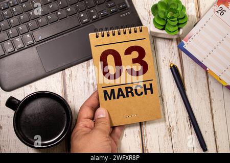 3 Marz on wooden grey cubes. Calendar cube date 03 March. Concept of date. Copy space for text or event. Educational cubes. Wood blocks in box with da Stock Photo