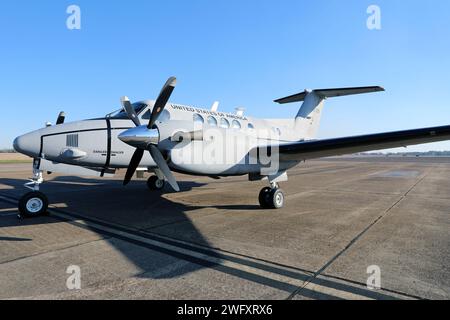 A C-12 Huron airplane assigned to Detachment 1, Company B, 1st Battalion, 228th Aviation Regiment, U.S. Army Reserve, Fort Novosel, Alabama, is parked at Cairns Army Airfield Jan. 31, 2024. Stock Photo