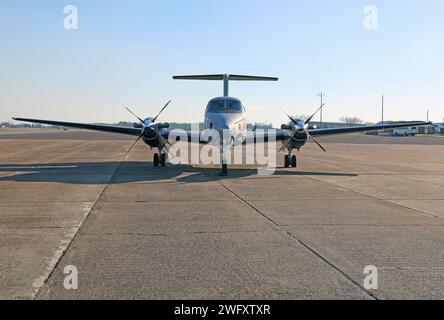 A C-12 Huron airplane assigned to Detachment 1, Company B, 1st Battalion, 228th Aviation Regiment, U.S. Army Reserve, Fort Novosel, Alabama, is parked at Cairns Army Airfield Jan. 31, 2024. Stock Photo