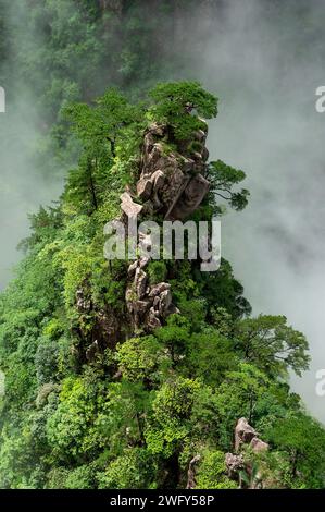 Clouds float amidst the Second Ring Road in West Sea (Xihai) Grand Canyon of Huangshan Yellow Mountains. Stock Photo