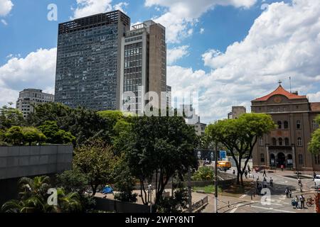 Partial view of tall Fernao Dias (front) and Mirante do Vale (back) buildings nearby Largo Sao Bento square in downtown under summer sunny day. Stock Photo