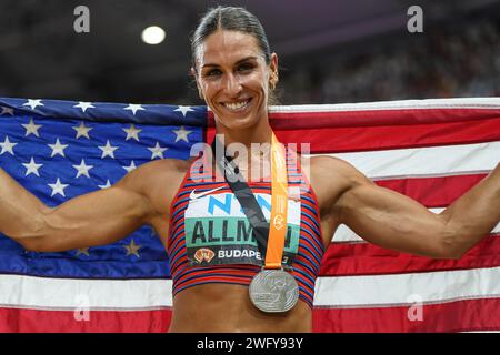 Valarie ALLMAN celebrating his medal with the flag in the Budapest 2023 World Athletics Championships. Stock Photo