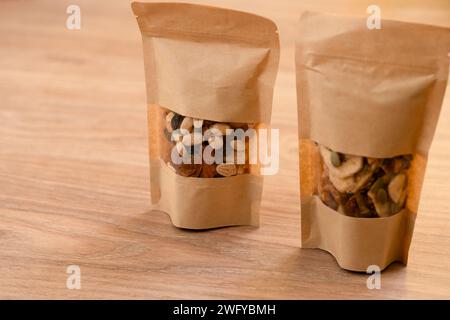 mix of nuts on a paper bag, healthy mix, healthy diet, healthy snack Stock Photo