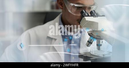 Scientist conducting research in a laboratory, utilizing tubes and advanced equipment, focusing on scientific experiments and analysis in the fields o Stock Photo