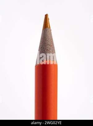 An orange wooden pencil on a white background. Stock Photo