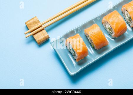 Sushi With Salmon On Blue Rectangular Plate Stock Photo