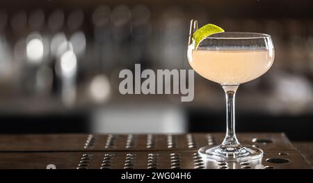 Exotic cocktail drink Daiquiri Twis on the bar counter in the pub. Stock Photo