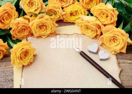 Orange roses and vintage paper, retro style Stock Photo