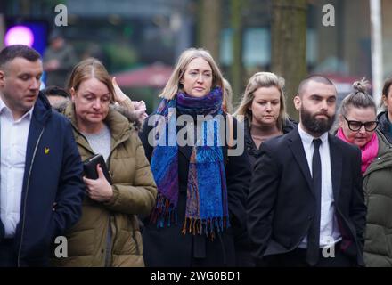 RETRANMITTING AMENDING CAPTION INFORMATION Brianna Ghey's mother Esther Ghey (centre) arrives at Manchester Crown Court as a boy and a girl, both 16, are due to be sentenced and named for the murder of teenager Brianna Ghey in a park in Culcheth, near Warrington. Brianna, 16, was stabbed with a hunting knife 28 times in her head, neck, chest and back after being lured to Linear Park on the afternoon of February 11 last year. Picture date: Friday February 2, 2024. Stock Photo