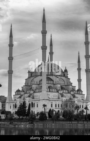 The Sabanci Central Mosque in Adana,  located along the Seyhan River, Turkiye. Opened in 1988. Stock Photo