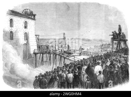 The Fatal Accident at New Hartley Colliery: removal of the coffins containing the bodies, 1862. The Hartley Colliery disaster was a coal mining accident in Northumberland, England, that occurred on 16 January 1862 and resulted in the deaths of 204 men and children. The beam of the pit's pumping engine broke and fell down the shaft, trapping the men below. The disaster prompted a change in British law that required all collieries to have at least two independent means of escape. From &quot;Illustrated London News&quot;, 1862. Stock Photo