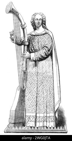 The International Exhibition: angel from the Hereford Screen, designed by G. G. Scott, R.A., manufactured by Skidmore's Art-Manufacturers' Company, Coventry, 1862. 'This work...the grandest and most triumphant achievement of modern architectural art...the largest art-work in metal of which we have knowledge...fitly illustrates the most glorious scene ever enacted on this earth - the Ascension of our Lord...At each side are angels hymning his glad welcome to the slues; and how full of wondering adoration is their gaze!...One feature of the screen which should not be overlooked or passed slighti Stock Photo