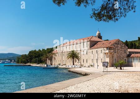 Beautiful, stone made Badija island monastery, with red clay rooftop, popular tourist destination in Korcula island archipelago Stock Photo