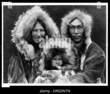 A family group-Noatak, c1929. Three Eskimos posed. Stock Photo