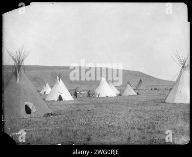 Atsina camp scene, c1908. Tipis on plains. Stock Photo