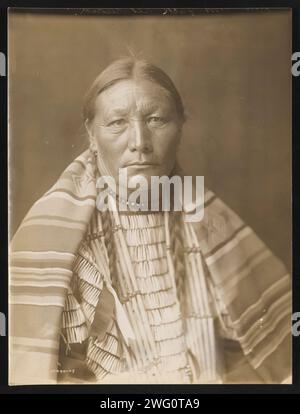 Mrs. Jack Red Cloud, 1905. Photograph shows Mrs. Red Cloud, wearing shawl, head-and-shoulders portrait, facing front. Stock Photo