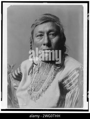 Long Time Dog, c1908. Long Time Dog, head-and-shoulders portrait, facing front. Stock Photo