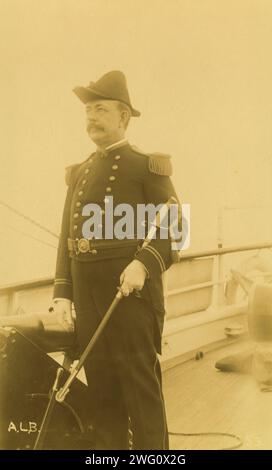 &quot;Webber,&quot; a naval officer or ship captain, three-quarter length portrait, standing, facing left, holding sword, 1894 or 1895. Stock Photo