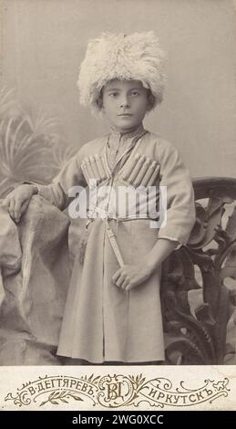 Portrait of a boy Leonid in a Caucasian national costume, end of 19th century. This collection contains 136 photographs of Irkutsk from the late nineteenth and early twentieth centuries. The photographs show views of both the city of Irkutsk and countryside of Irkutsk Province; methods of transportation; and the citizenry, including their way of life, social activities, and forms of entertainment. Irkutsk Municipal History Museum Stock Photo