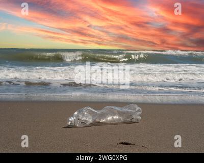 Plastic bottle on the beach Plastic waste in the sea Stock Photo