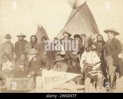 Indian chiefs and U.S. officials. 1. Two Strike. 2. Crow Dog. 3. Short Bull. 4. High Hawk. 5. Two Lance. 6. Kicking Bear. 7. Good Voice. 8. Thunder Hawk. 9. Rocky Bear. 10. Young Man Afraid of His Horse. 11. American Horse. 12. W.F. Cody (Buffalo Bill). 13. Maj. J.M. Burk. 14. J.C. Craiger. 15. J. McDonald. 16. J.G. Worth. Taken at Pine Ridge, Jan. 16 '91 []. Group of Euro-American and Lakota (Brule&#xb4;, Miniconjou, and Oglala) men standing and sitting in two rows in front of tipis; men in front are holding a NY World pennant. Stock Photo