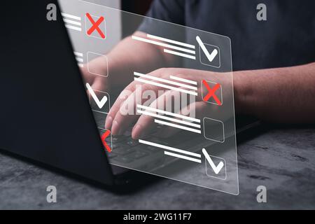 Woman use laptop with hologram interface of document management system. DMS. Checklist and clipboard task management. Productivity checklist. Stock Photo