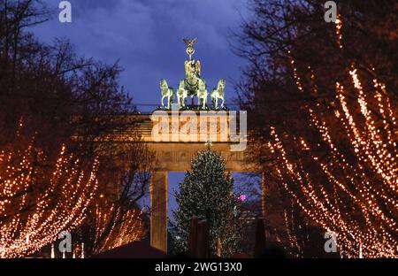 The street Unter den Linden at the Brandenburg Gate is decorated for Christmas, Berlin, 20 December 2021 Stock Photo