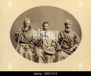 A Group of Blind Invalid Convicts at the Aleksandrovsk Poorhouse, 1891. One of 74 views taken in July 1891 and contained in the albumTipy i vidy Nerchinskoi katorgi (Views and inhabitants of Nerchinsk hard labor camps). The Nerchinskkatorgawas part of the katorga (forced labor) system of imperial Russia, located in the province of Transbaikalia (present-day Zabaykal'skiy Kray), near the Russian border with China. The katorga was administered by the Ministry of Interior and included prisons at Akatuy, Kara, Aleksandrovsk, Nerchinskii Zavod, and Zerentuy, all of which are depicted in the album. Stock Photo