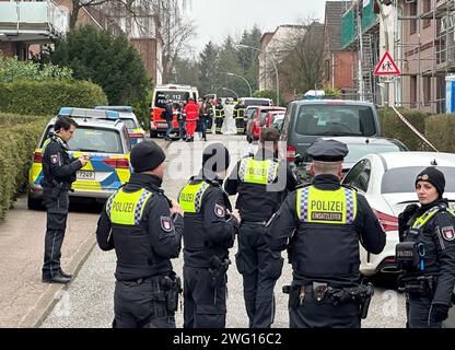 Hamburg, Germany. 02nd Feb, 2024. Police and emergency services are at the scene. Two people have been found fatally injured in Hamburg-Billstedt. Credit: Steven Hutchings/dpa/Alamy Live News Stock Photo